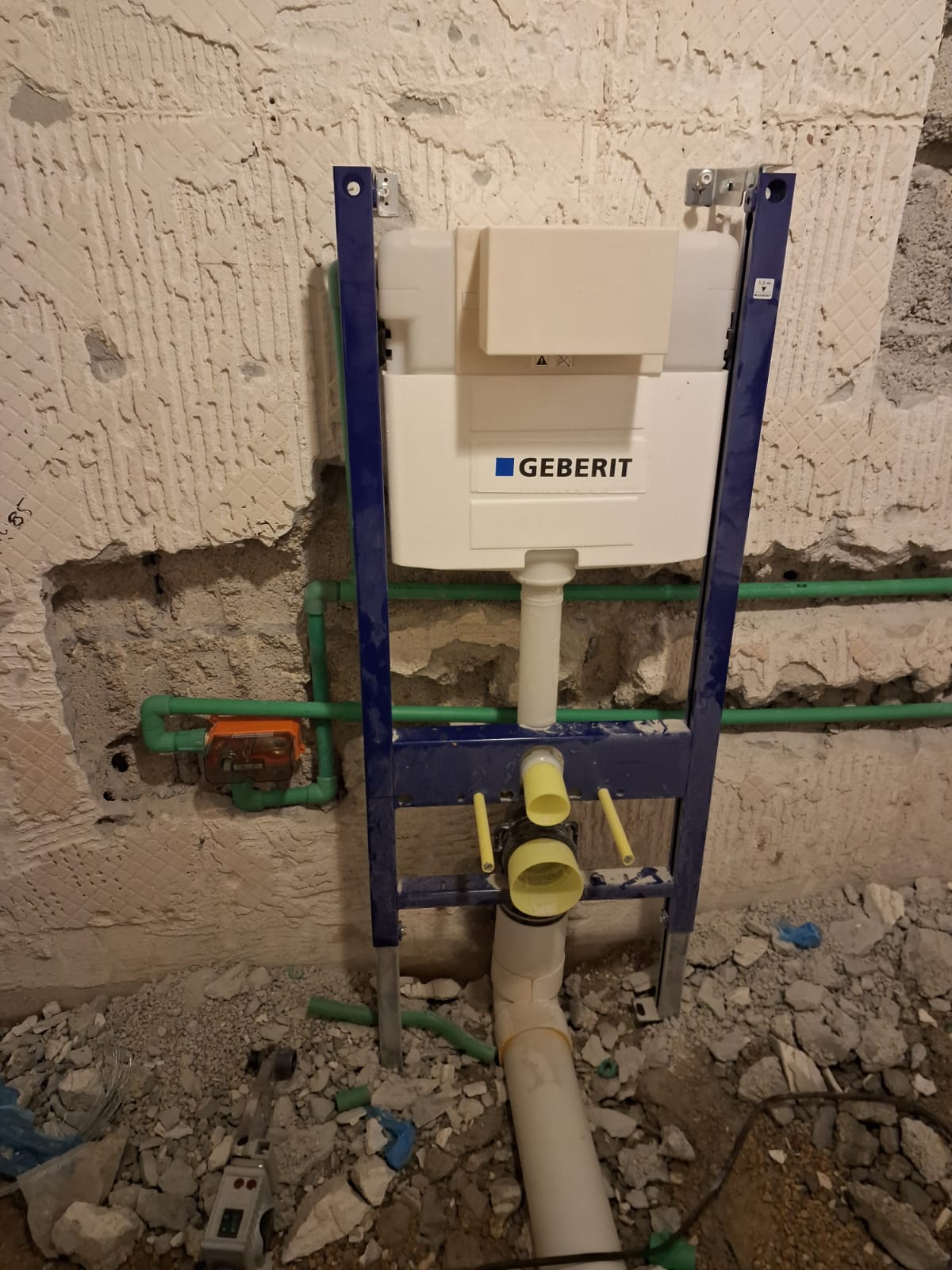 Concealed cistern and water heater connections installed by Sabbaq Fannan Al Riyadh